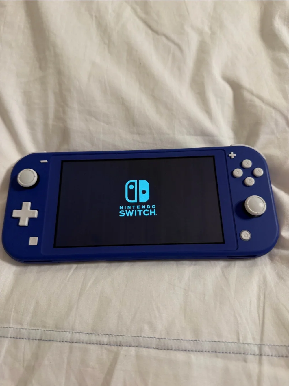 Nintendo Switch Lite Blue Handheld Console with White Buttons